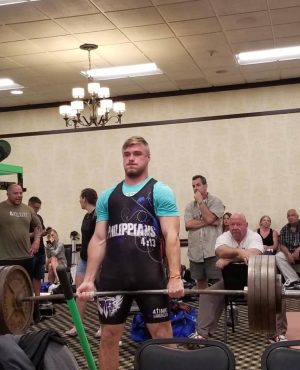 Senior Noah Strine pulls 515 pounds in his state record deadlift. On that day, Strine also set a world bench press record for his age. 