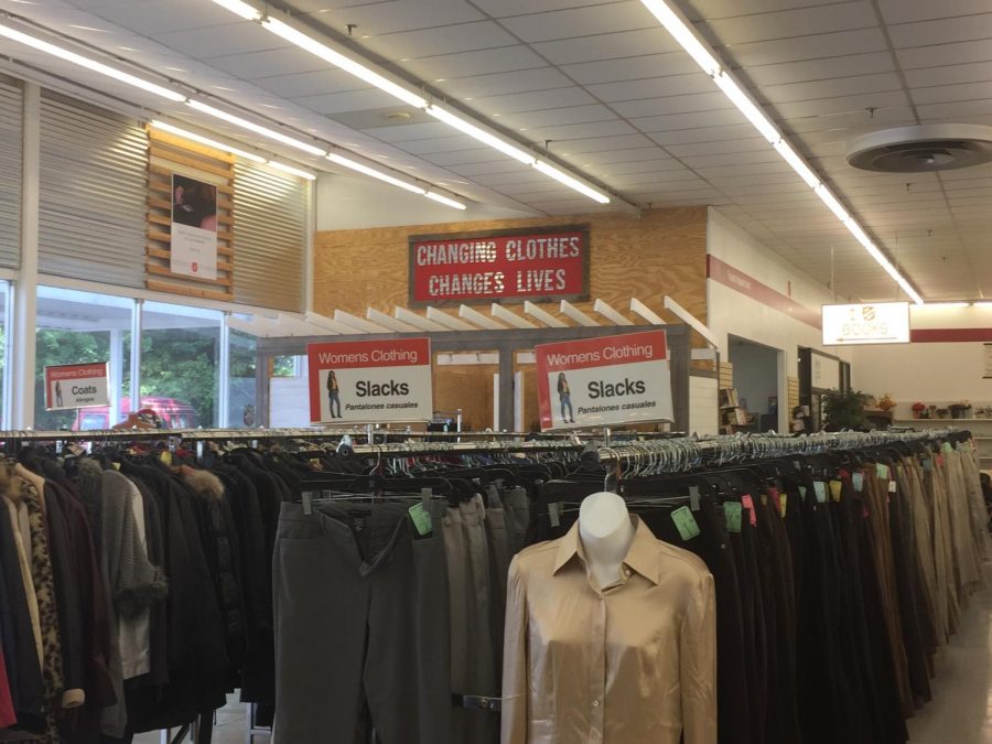 The sign above the changing rooms in Salvation Army reads, “Changing Clothes Changes Lives” as a reminder that the money received from sales benefits those in need. 
