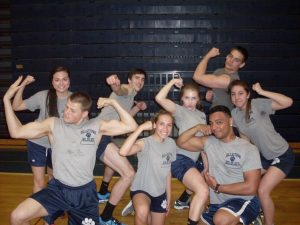 In this photo, circa 2015, students show their enthusiasm for gym class and show off the standard gym uniform of the pre-trimester era. 