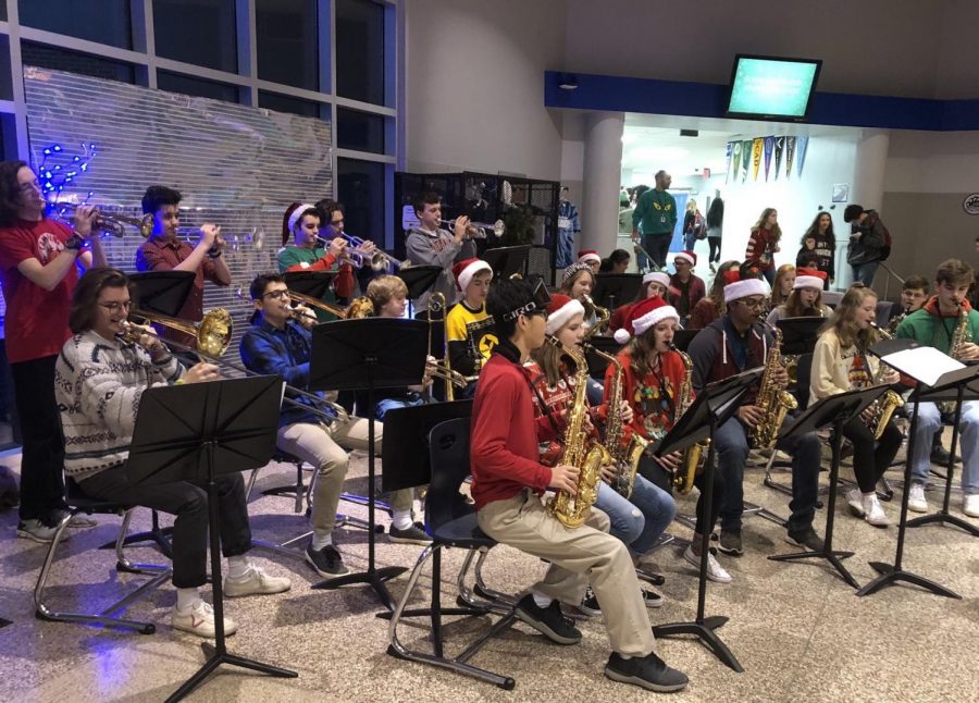 Members of the Jazz Band perform Friday morning in the front lobby to kick of Welcome to Winter Day. The last day before break was filled with food, music, assemblies, and ugly sweaters. 