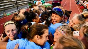 The Field Hockey team celebrating after head coach Jeri Myers 500 win this season.