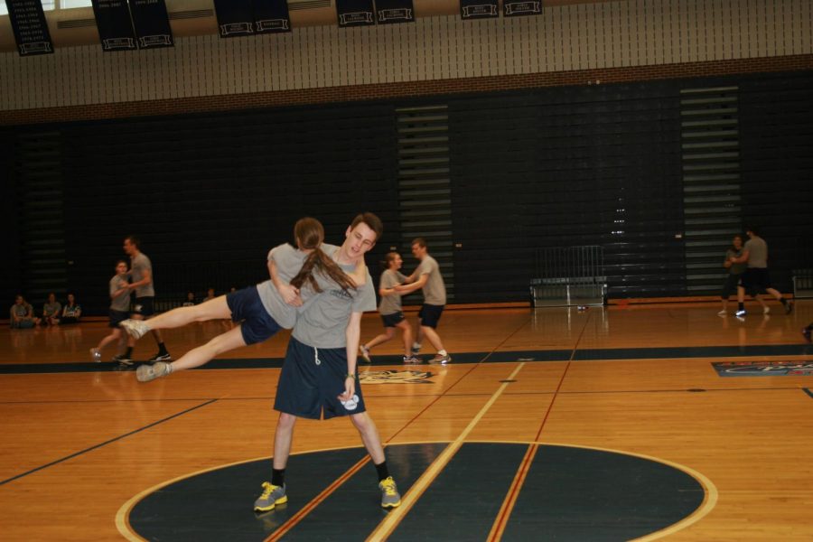 Students swing their partner around them in an effort to impress the polka judges (aka the gym teachers) during the polka unit in gym. Tricks, flips, stunts, and props were often added to routines to make an impression on the dance floor. Students looked forward to the polka unit in gym every year, going all out to become the champions. 