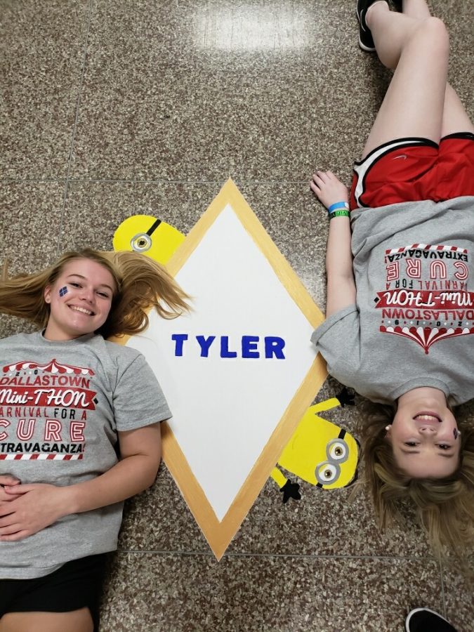National Art Honor Society painted diamonds with Four Diamonds kids names in them. My friend and I posed by Tyler Bryants s diamond before the event began to honor his legacy. Bryant passed away in June 2016. 