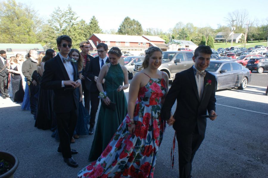 Students and their guests make their way into Wisehaven Event Center for Dallastown Prom on Saturday, April 27, 2019. 