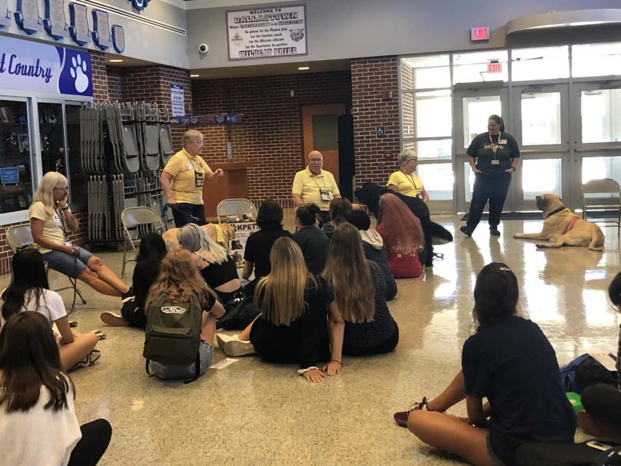 One of the optional sessions at the pullout day for freshman was learning about therapy dogs in the back gym lobby. 