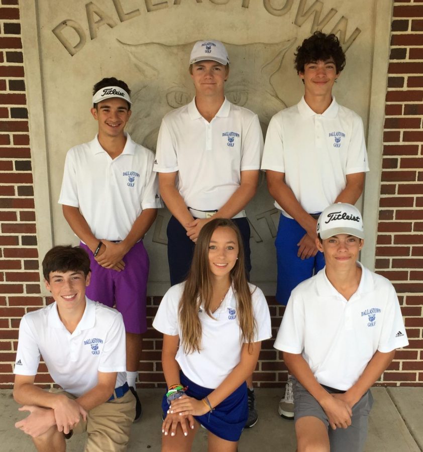 Members of the golf team take a quick snapshot before leaving for the YAIAA tournament. Standing: Michael DeRose, Owen Brown, Brock Altland. Kneeling: Bobby Nicholson, Makensy Knaub, Brady Altland.