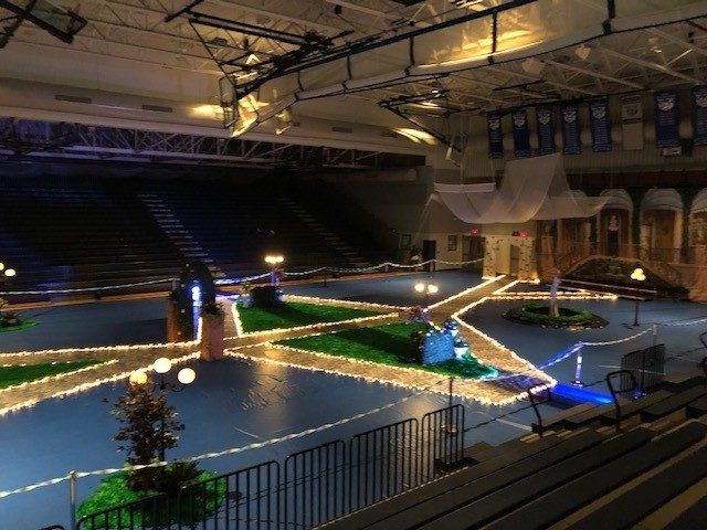 This aerial view was taken before the high school gym was flooded with fashionable students and their parents watching their blue carpet arrivals. Student Council worked all fall to create the Gatsby themed dance, 