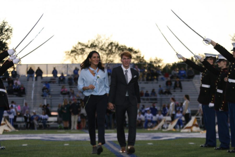 Senior members of the 2019 Homecoming Court were recognized before the game with their parents. 