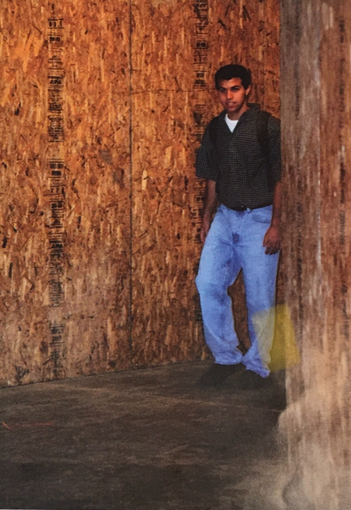 Senior Wade Vigna travels through one of many makeshift plywood hallways in order to get to class.