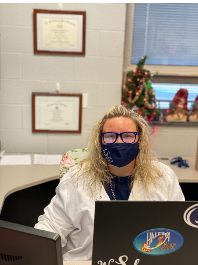 Dallastown High School Nurse Whitney Sams spends much of her day this year at her desk monitoring students and symptoms of COVID-19. 