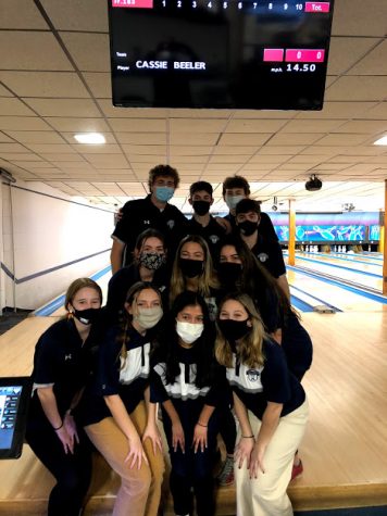Some of the bowling club members posing for a picture during one of their 2020-2021 season matches. The bowling club has become a popular way to socialize and make new friends.