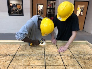 Two Dallastown students take part in the construction academy program at York County School of Technology. Construction is one of the several trade programs offered to Dallastown students.