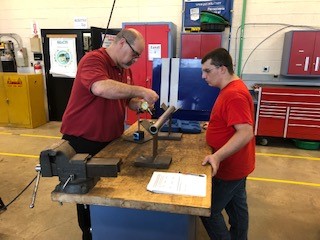 Justin Dillon, a 2019 Dallastown graduate, learns from a York County School of Technology (YCST) instructor. Dillon participated in the part-time automotive program at YCST.
