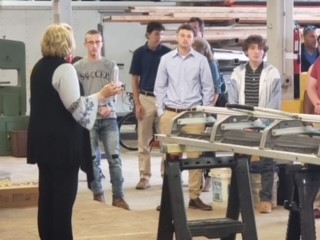 Dallastown students, 2019, gather around for instruction from Deb Rohrbaugh. Rohrbaugh heads up the pre-apprenticeship program at Kingsley Construction.