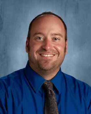 Although Business teacher  Mr. Robinson has only been at DHS for three years, he became a Wildcat after teaching 11 years at Spring Grove.  