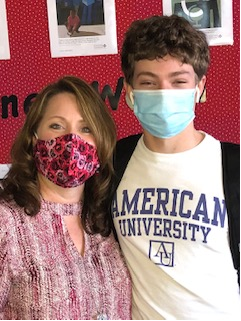 Mrs. Dallmeyer and her son, Kurt Dallmeyer, smiling under their masks for the picture being taken at DAHS.