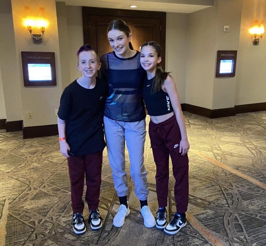 Landon has been a competition dancer for three years. In the middle is Michaela Long, his teammate and coach. On the right is Jane Shearer, his teammate and duo partner. Knepp and Shearer have won first at their last two competitions.