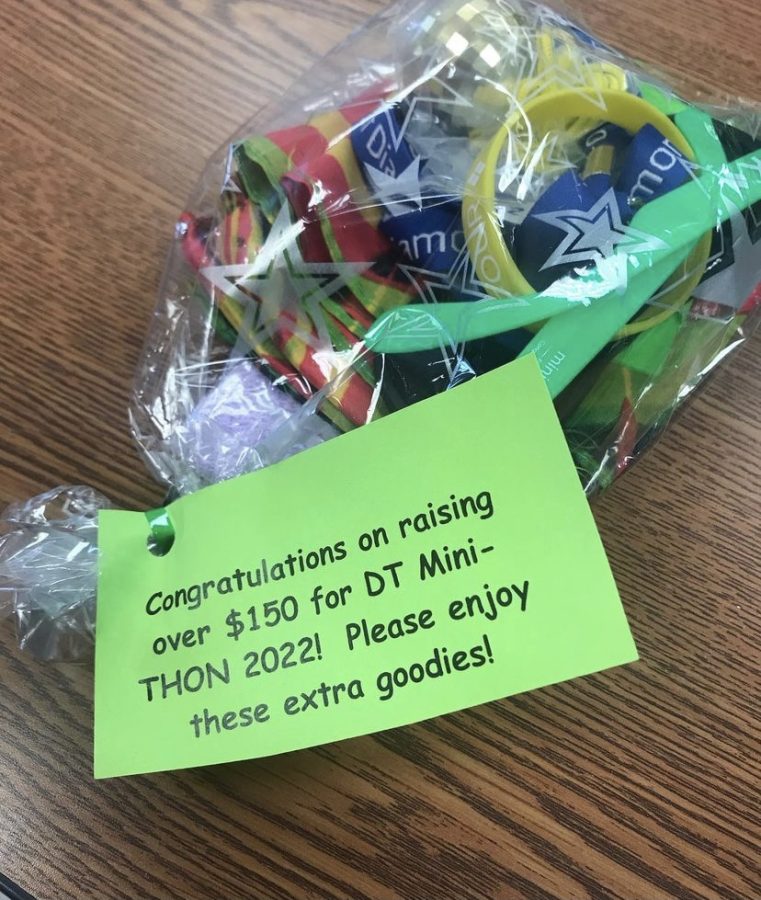 Finance puts together a bag of goodies for students who raise over $150. Its put in their drawstring bag with their t-shirt once they register for the event!