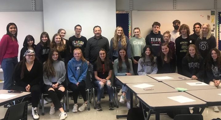 The high school students posed for a picture with Navarolli after finishing their press conference. Each student asked questions, took notes, and listened thuroughly to Navarolli and his experiecne as a sports journalist.