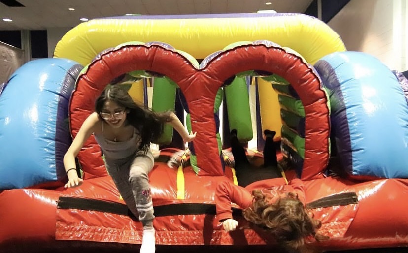 The entertainment committee calls and rents whatever activities they believe would be fun for Mini-THON attendees. The bounce house is an annual activity located in the wrestling room. 