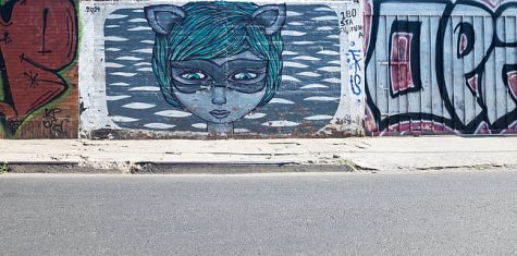 A Chilean wall mural  of the notorious Femme Fatale, Catwoman. The Femme Fatale is a mischievous woman who uses her seductive nature to get what she wants.
