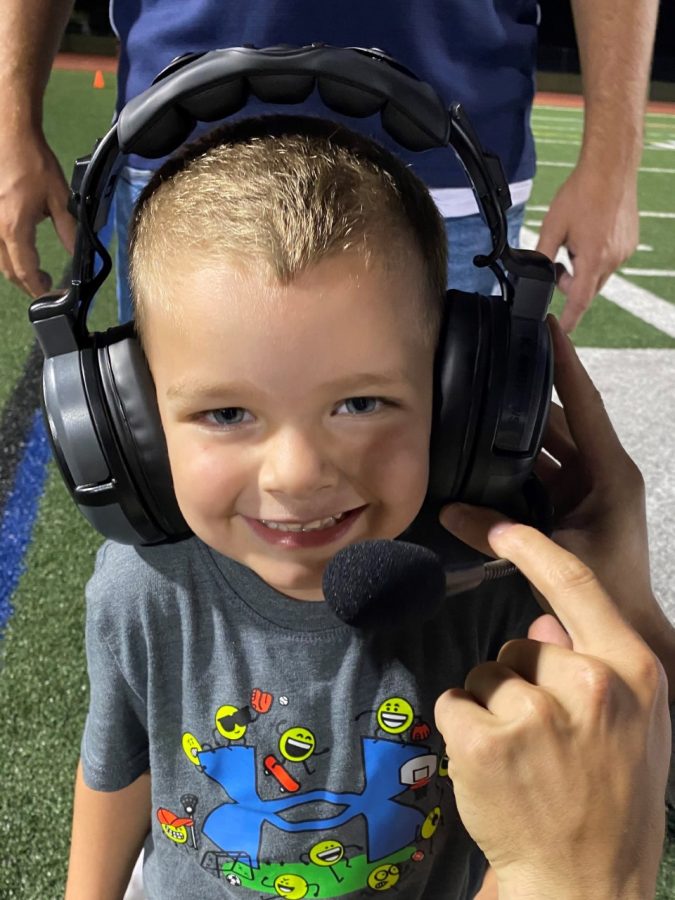 Luckenbaughs son Camden enjoys attending the Dallastown sporting events. Here, he is wearing one of the football coaches headsets.