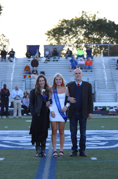 This years Homecoming Court nominees presented by their parents before the football game.