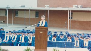 Class graduate of 1986 and now current Dallastown high school teacher, Mr. Ilyes, gives his speech in front of his class on graduation night out in the parking lot due to track renovations.