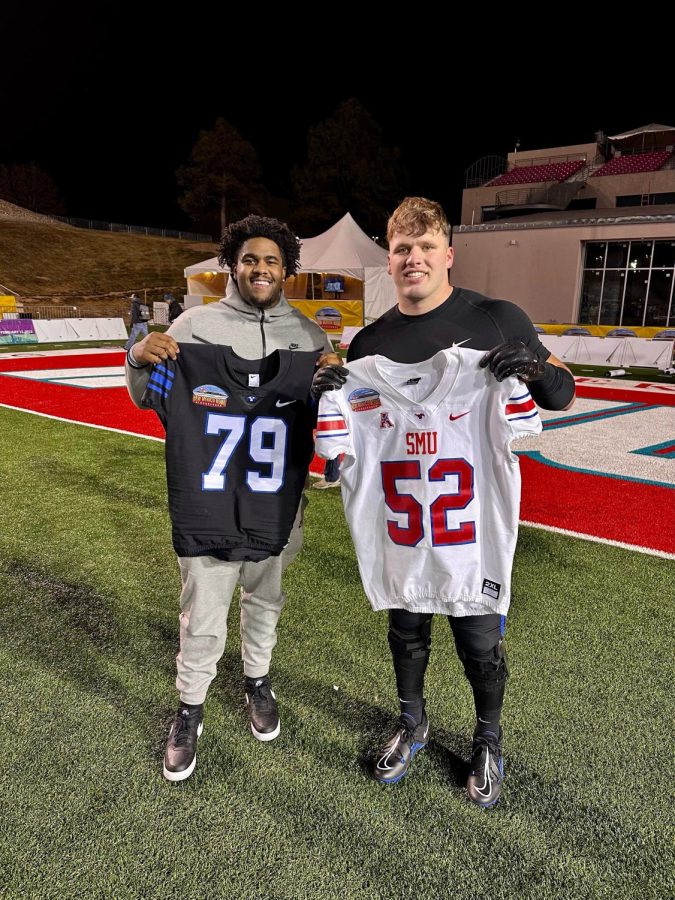 Former Dallastown football teammates and childhood best friends Ricky Cole (left) and Ben Ward (right) trade jerseys after New Mexico Bowl.  