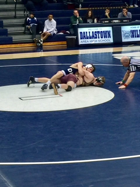 Turnbull wrestles a match in the Dallastown gym during his high school career.