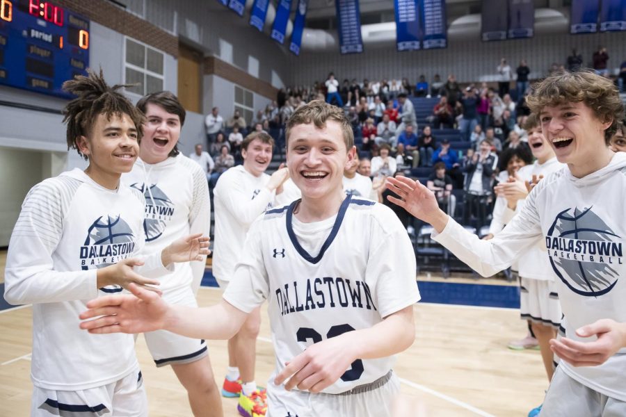 Dallastown+senior+Jonah+Stefko+smiles+as+his+teammates+cheer+him+on+during+the+starting+lineup+introductions