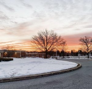 The sun begins to rise before Dallastown students enter school early to start their day.