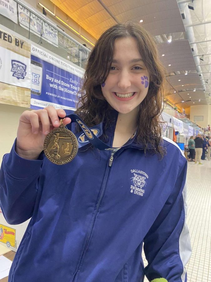 Swimming a fast time of 23.80 seconds in states, is Julia Havice. She swam the 50 free and was awarded for her eighth place finish with a medal.