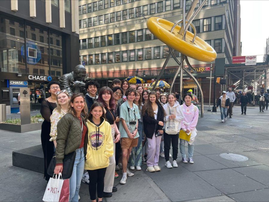 Fashion club advisor, Mrs. Guttridge, as well as students in front of The Button in the Fashion District. This was taken before they got a guided tour of the district.