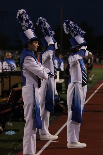 Julie Cioffi (Left), Max Scarcelli (Center), Victor Vaida (Right) do their special salute during halftime at Hershey.