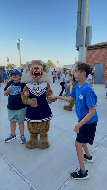 Andrew Breault with Wilma Wildcat at the newly renovated American Legion Field at Wildcat Stadium.  