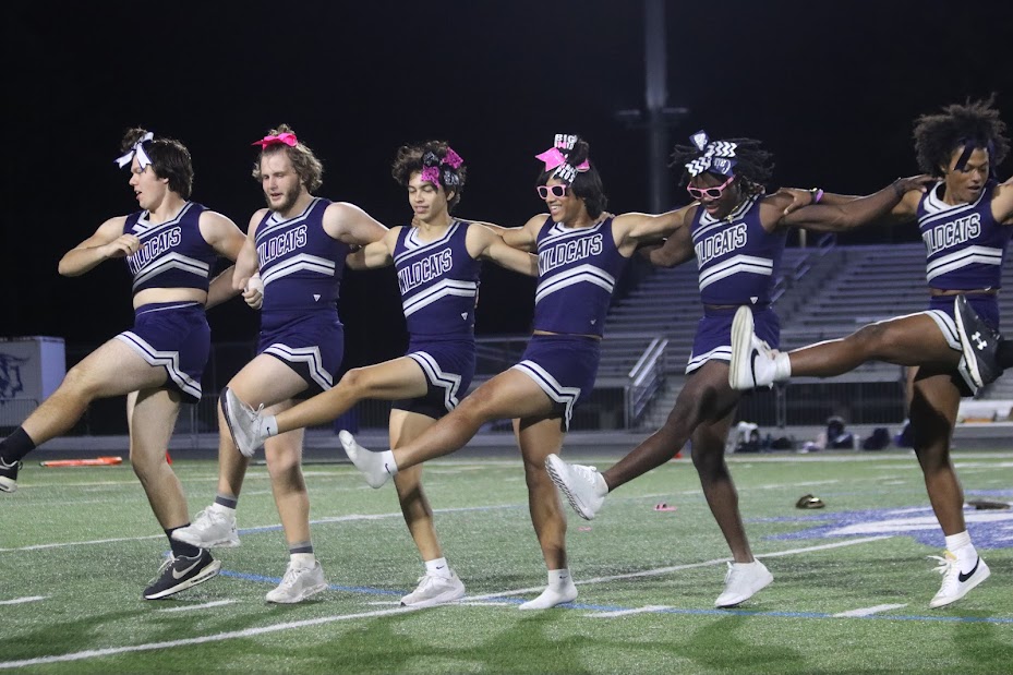 The newest cheerleaders kicklined during their halftime performance. 