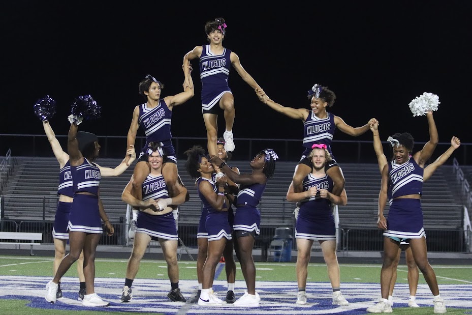 The newest cheerleaders took the field for the Homecoming performance, ending with a pyramid. 