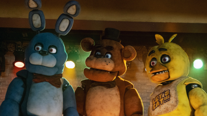 Bonnie, Freddy, and Chica; all made by Jim Hensons Creature Shop, line the center stage for their debut film 