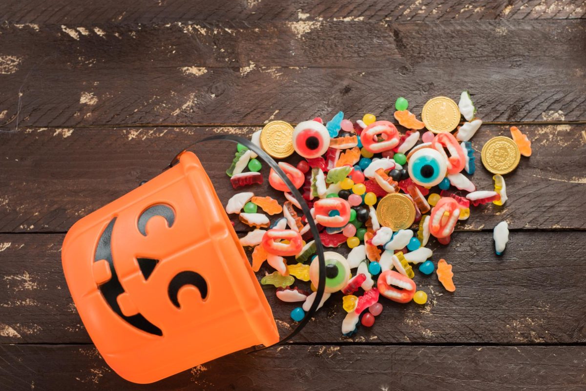 A Halloween bucket dumped after Trick-or-Treating filled with treats that can be collected the night of Halloween.
