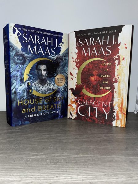 The first two books in the Crescent City series by Sarah J Mass. Both are in hardback form.