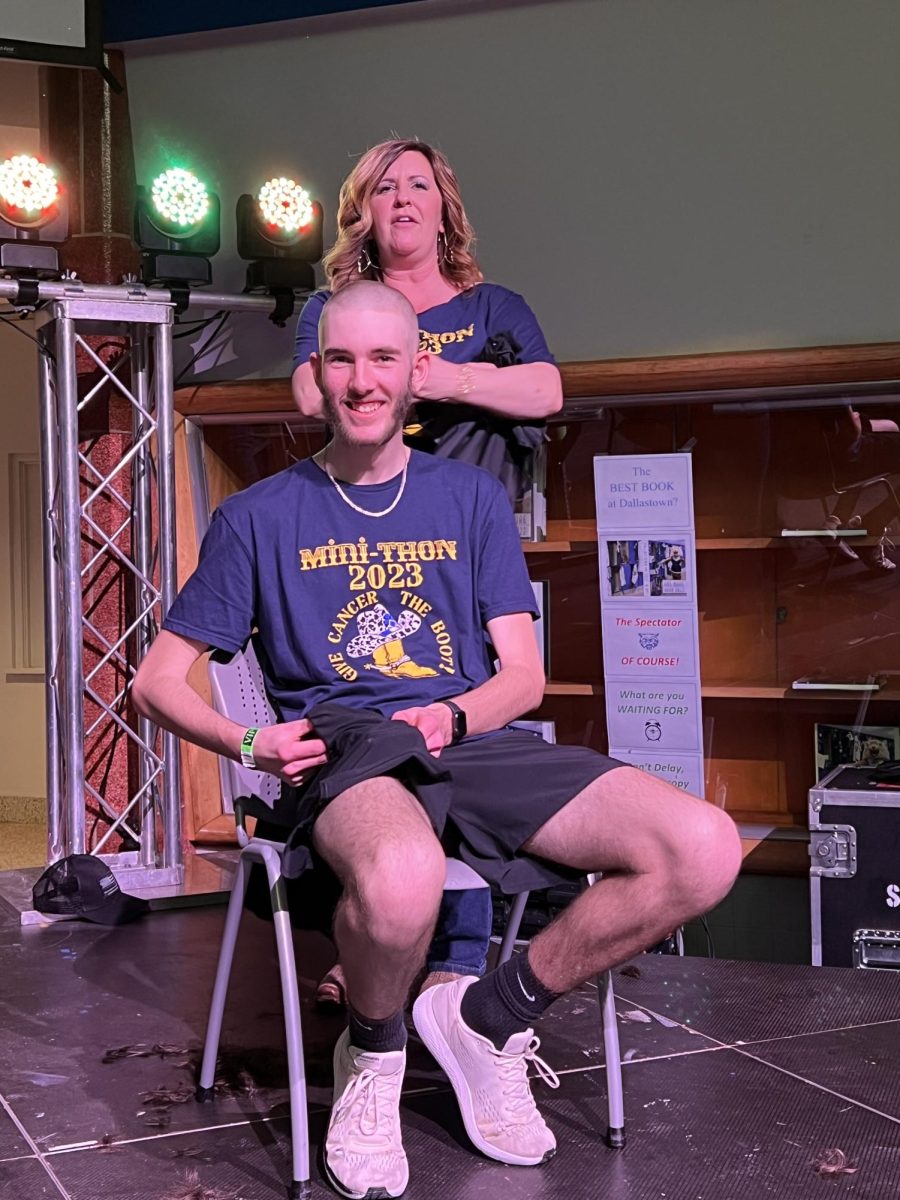 A favorite activity at the event is hair cutting. While many girls will donate their hair, some guys, including Seth Stotler (Class of 23) shave their heads to show support. 