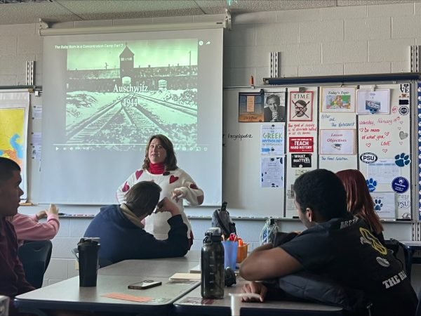 Standing in front of her class, with all attentive eyes on her. Molly Dallmeyer teaches a room replete with dedicated students about the horrors of the Holocaust.
