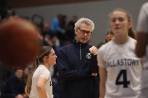 Coach Jay Rexroth has a long and storied history with Dallastown basketball. After being a student athlete for the Wildcats, he returned to find success as the head coach of the boys team and now the head coach of the girls team. Here, he speaks to players Praise Matthews and Alonna Dowell before the start of the second half of the game vs. Central Bucks East. 