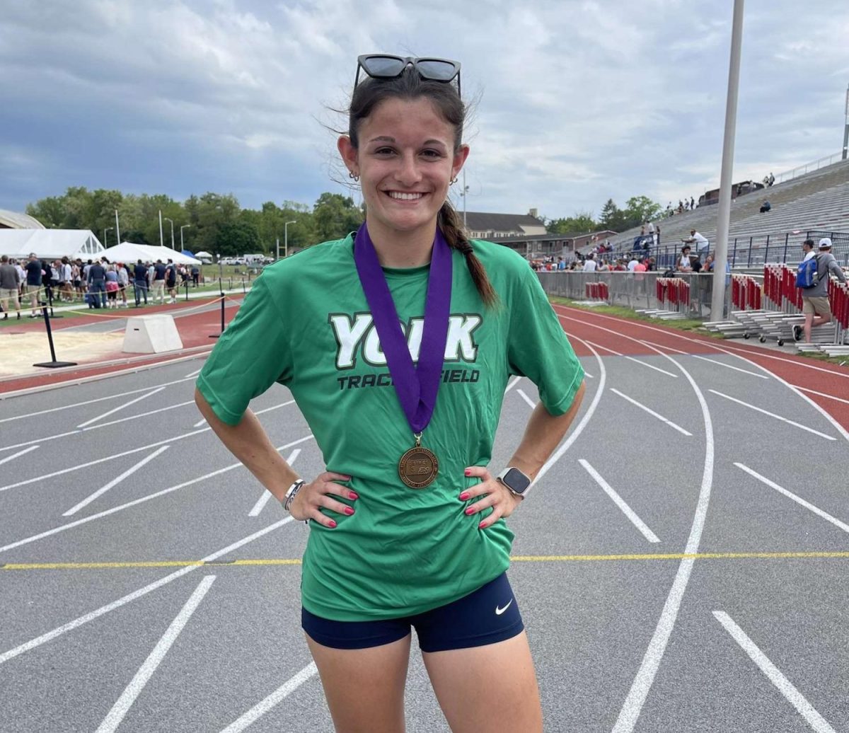 Cottrell%2C+sporting+her+York+College+t-shirt%2C+after+placing+7th+in+the+district+for+the+200m.+This+was+her+first+and+last+districts+during+her+senior+year+at+Dallastown+in+2023.
