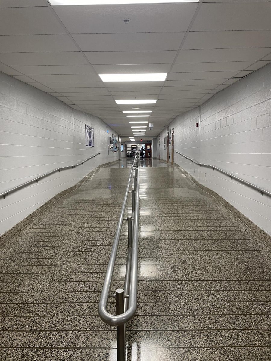 One of the hallways in the english part of the building, that features little color. Students walking up and down the ramp everyday should see more than just gray when going from class to class. 