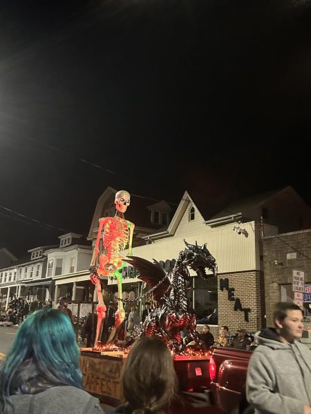 2022 Halloween parade float with a skeleton.