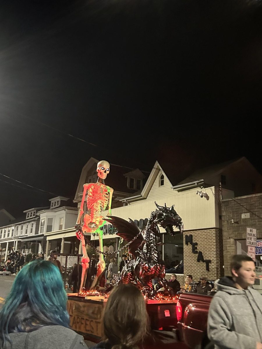 2022 Halloween parade float with a skeleton.