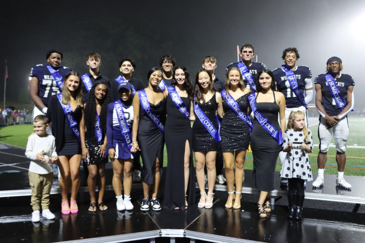 Homecoming court gathered for the crowning of King and Queen.