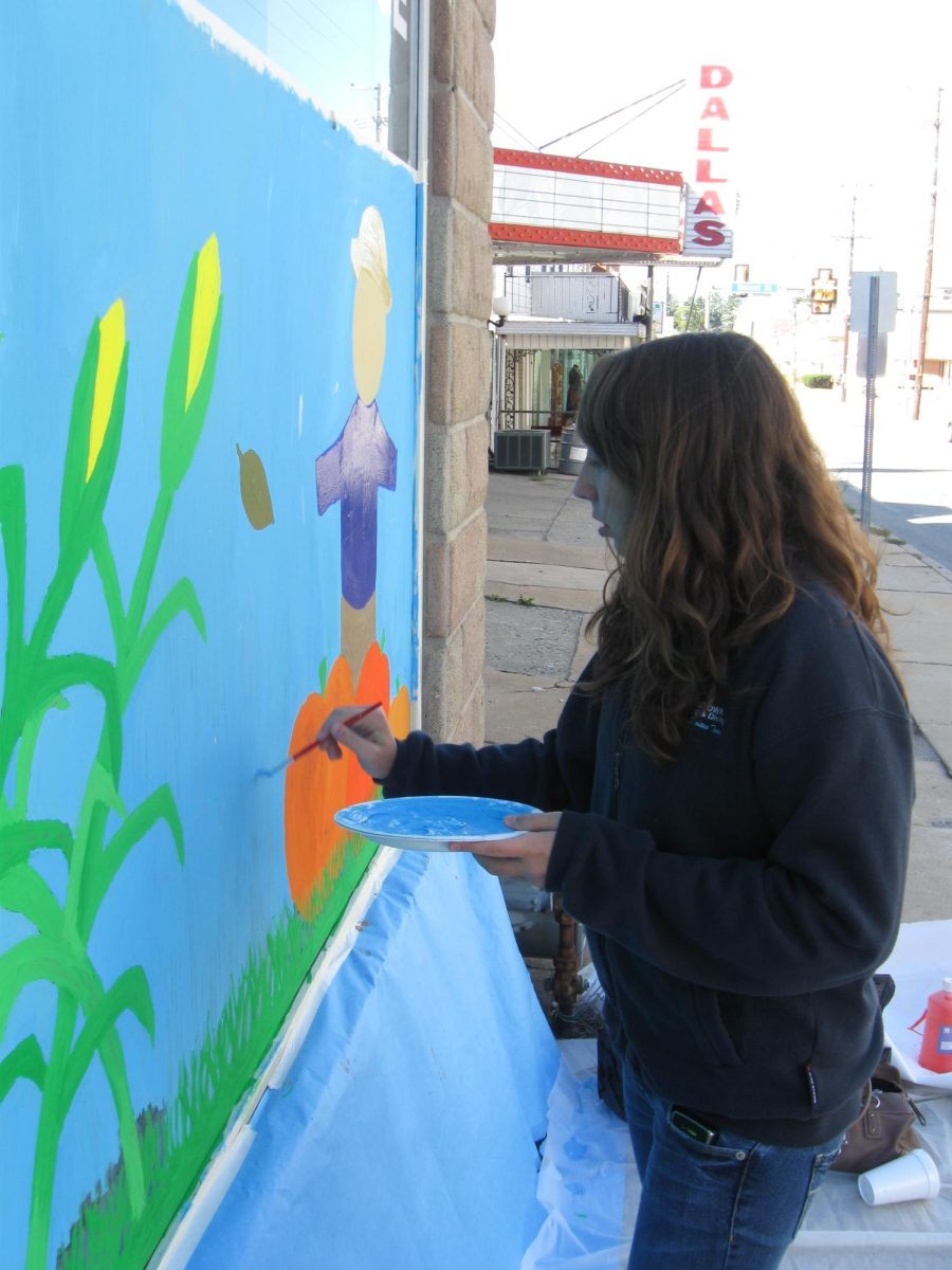 Art students painting their Halloween murals on local Dallastown businesses.